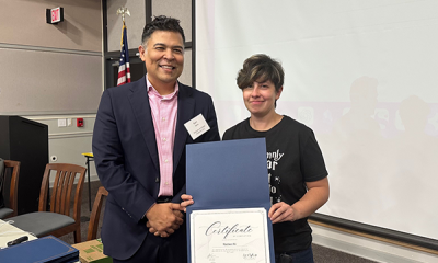 Completion certificate for LLNJ’s PM Fundamentals + AI Integration Bootcamp, presented by Sam Sena (left) to Radwa Ali, Montclair Public Library