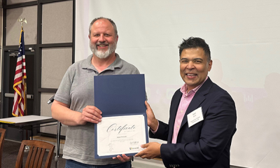 Completion certificate for LLNJ’s PM Fundamentals + AI Integration Bootcamp, presented by Sam Sena (right) to Adam Petroski, Raritan Public Library